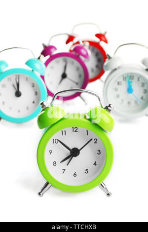 A group of alarm clocks, isolated on white Stock Photo