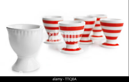 Red and White stripe egg cups, isolated on white Stock Photo