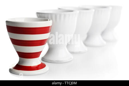 Red and White stripe egg cups, isolated on white Stock Photo