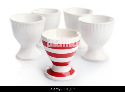 Red and White stripe egg cups, isolated on white Stock Photo