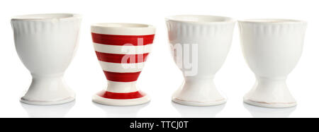 Red and White stripe egg cups, isolated on white Stock Photo