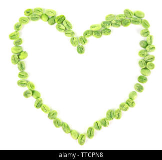 Heart shaped peanuts isolated on white Stock Photo