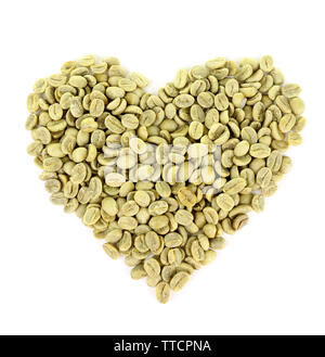 Heart shaped peanuts isolated on white Stock Photo