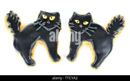 Creative cat shaped Halloween cookies isolated on white background Stock Photo