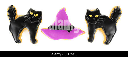 Creative cat shaped and hat Halloween cookies isolated on white background Stock Photo