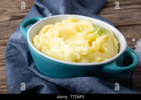 Mashed Potatoes In Bowl On Wooden Background Closeup, Top View Stock 