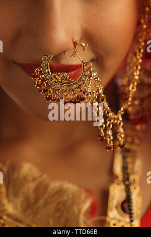 close up of a bridal face with nose ring ttd66b