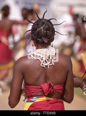 Young female Mandinka dancer at tribal dance show, Banjul, Republic of The Gambia Stock Photo