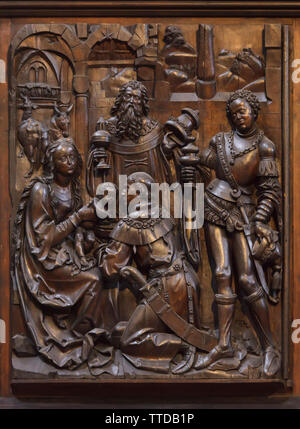 Adoration of the Kings depicted in the basswood carved relief by German sculptor Veit Stoss (Veit Stoß) on left side wing of the Nativity Altar (Veit-Stoß-Altar) in the Bamberg Cathedral (Bamberger Dom) in Bamberg, Upper Franconia, Germany. Stock Photo