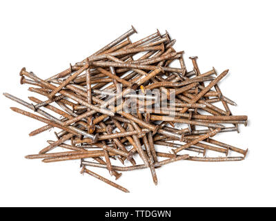 Pile of old wry rusty nails on white Stock Photo