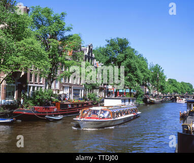 Canal excursion boat, Grachtengordel, Amsterdam, Noord-Holland, Kingdom of the Netherlands Stock Photo