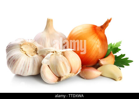 Garlic and onion with parsley leaves isolated on white Stock Photo