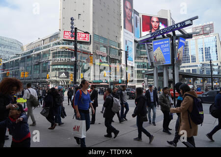 many people walking along yonge street in toronto canada during the day Stock Photo