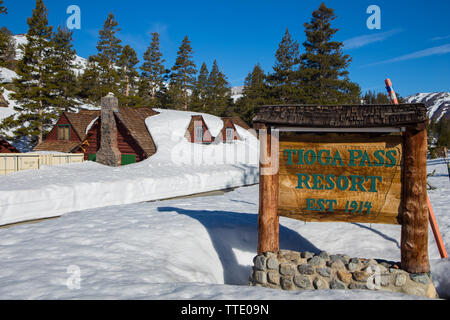 Wood cabins at The Tioga Pass resort in the Sierra Nevada mountains on highway 120 (Tioga Pass) California  2019 after a winter of record snow. Stock Photo