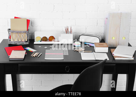 Office and school set with stationery and notebooks on a table Stock Photo
