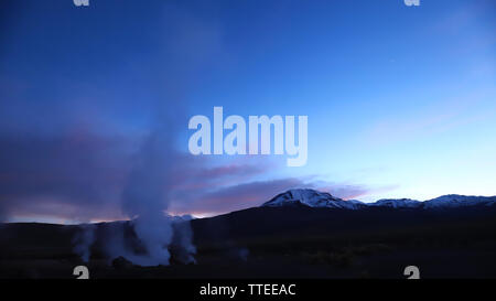 View at sunrise of El Tatio geyser field located in the Andes Mountains of northern Chile near San Pedro de Atacama Stock Photo