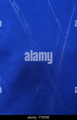 Blue leather texture with crumpled uneven surface Stock Photo