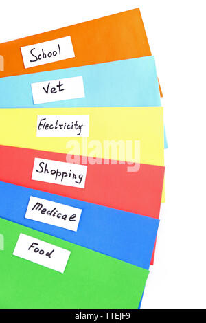 Colourful envelopes with money for needs isolated on white background Stock Photo