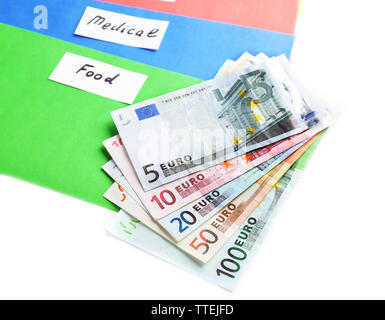 Colourful envelopes with money for needs isolated on white background Stock Photo
