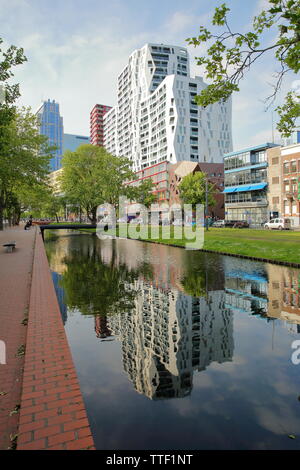 ROTTERDAM, NETHERLANDS - MAY 31, 2019: Modern buildings reflected on Westersingel canal along Mauritsweg street (near Kruisplein) Stock Photo