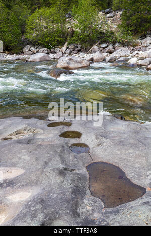 Rocky shoreline of the Stein River in British Columbia, Canada