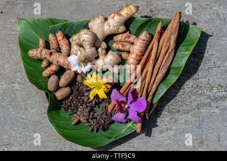 Fragrant spices on a green leaf, close up, top view, Indonesia Stock Photo