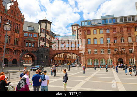 FRANKFURT, GERMANY - JUNE 13, 2019: Paulsplatz with beautiful architecture and Ratskeller with tourists in Frankfurt, Germany Stock Photo