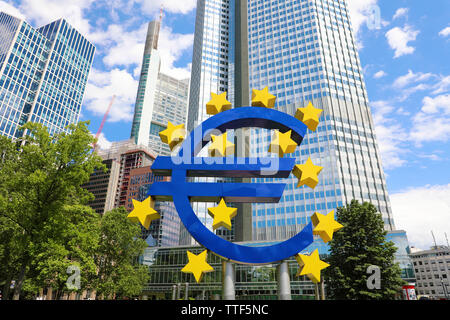 Business and finance concept with giant Euro sign at European Central Bank headquarters in the morning, business district in Frankfurt am Main, German Stock Photo