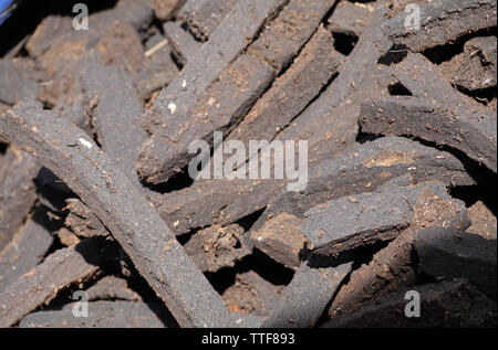 Milled peat briquettes in a small rural farm County Westmeath, Leinster Province, Ireland Stock Photo