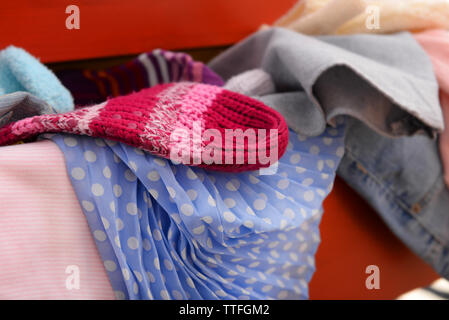 Pile of clothes in open drawer, close up Stock Photo