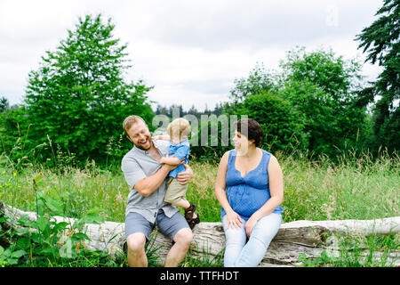 Straight on portrait of a young family playing together Stock Photo