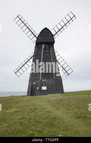 the windmill above the village of rottingdean in east sussex Stock Photo