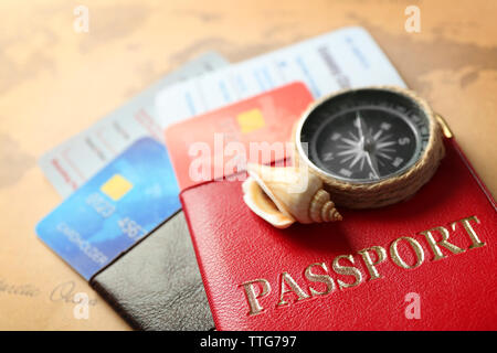 Credit cards with passports and tickets for vacations on the world map background Stock Photo