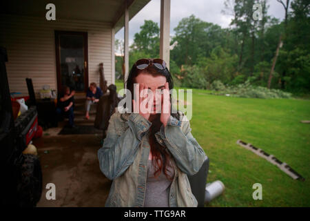 Nicole Rood and her boyfriend Brett Cantrell hug after they survived a ...