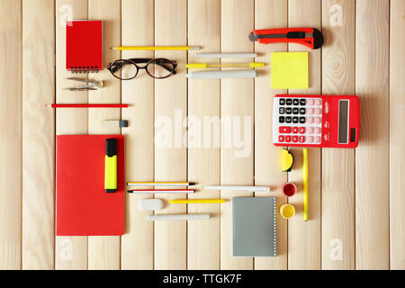 Flat lay of stationery on wooden background, copy space Stock Photo