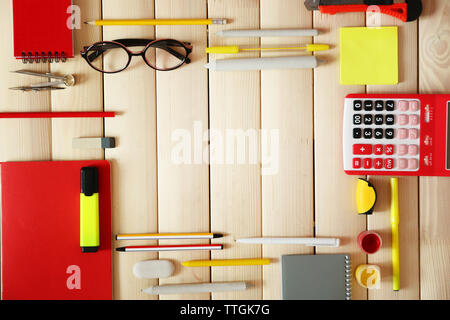 Flat lay of stationery on wooden background, copy space Stock Photo