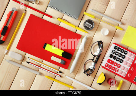 Flat lay of stationery on wooden background Stock Photo