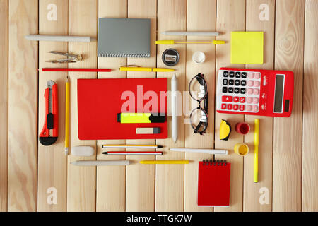Flat lay of stationery on wooden background Stock Photo