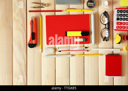 Flat lay of stationery on wooden background Stock Photo