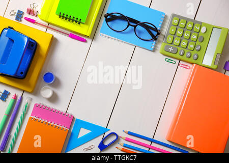 Flat lay of stationery on white wooden table background, copy space Stock Photo
