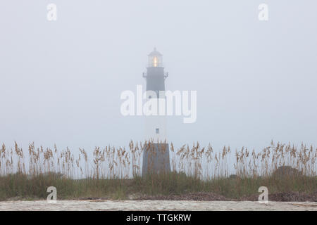 Lighthouse at foggy morning, Tybee island, USA Stock Photo