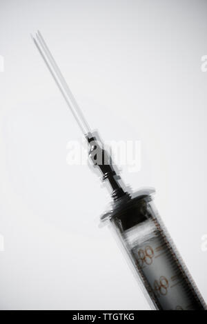 Vintage syringe and white background Stock Photo