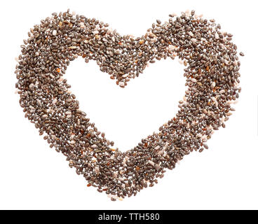 Pile of chia seeds in a heart shape isolated on white background Stock Photo