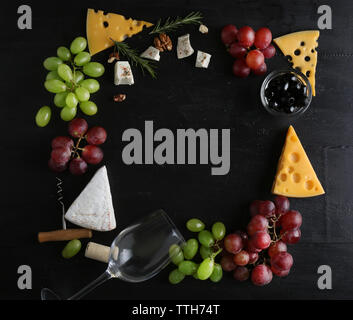 Wine, snacks and different various of cheese, flat lay Stock Photo