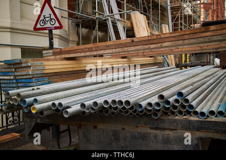 Professional scaffolding rods on the back of a work lorry. Stock Photo