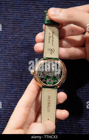 Bonhams, London, UK. 17th June 2019. Jacob & Co. A limited edition skeletonised 18K rose gold and diamond set manual wind wristwatch, estimate £5,000-7,000. Credit: Malcolm Park/Alamy Live News. Stock Photo