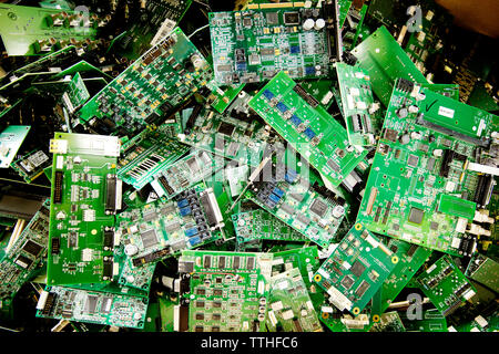 High angle view of abandoned mother boards in recycling plant Stock Photo