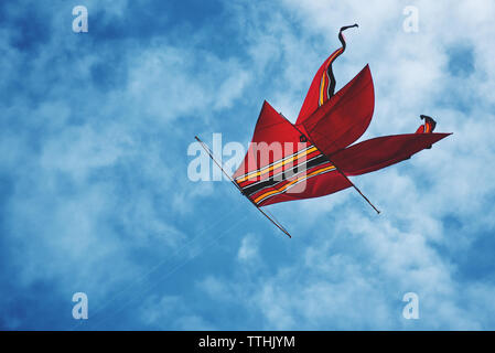 kite flying in the sky during a kite festival in Bali, Indonesia Stock Photo
