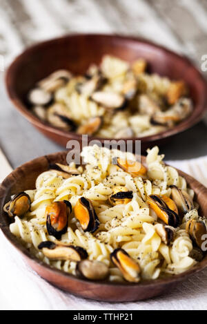 Pasta bowls served on table Stock Photo