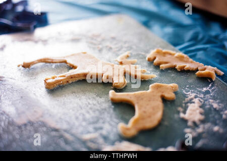 Close-up of gingerbread cookies on baking sheet Stock Photo